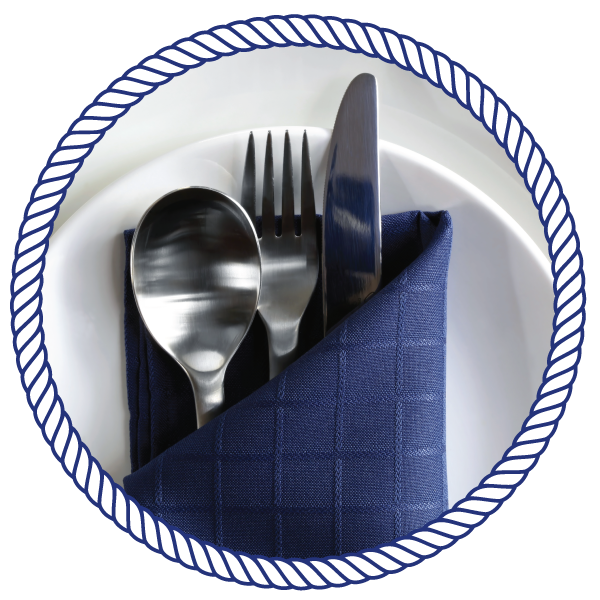 utensils on a napkin, on a plate