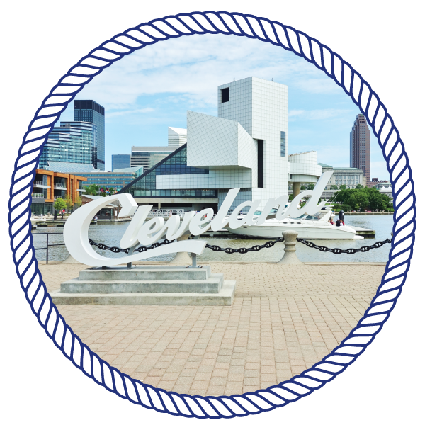 artistic buildings, with the sign "cleveland" on a pier